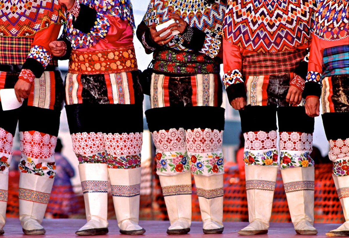 Closeup of Greenlandic National Costume worn by Inuit women performing traditional dance at the Great Northern Arts Festival in Inuvik, NWT, Canada