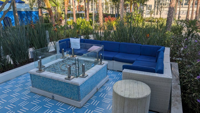 Hilton Buena Vista Palace Orlando amenities pool seating and fire pit Hilton Buena Vista Palace Orlando amenities pool seating and fire pit