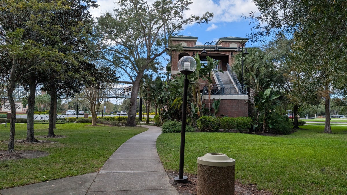 Hilton Orlando Lake Buena Vista amenities Disney Springs walkway bridge