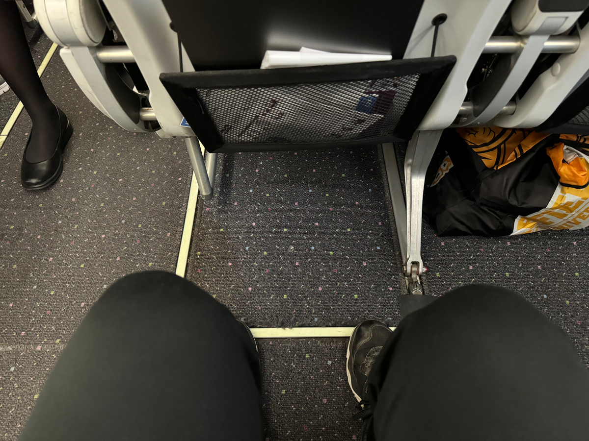 Volaris economy space at knees exit row