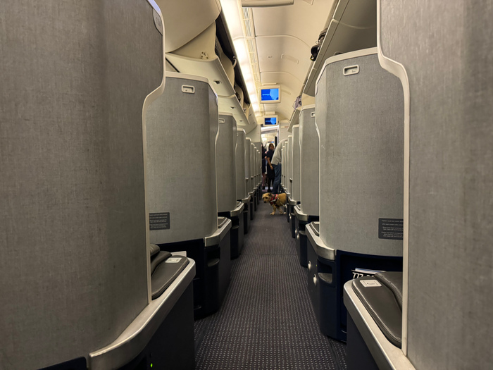 American Airlines B777 30 Business class airplane aisle American Airlines B777 30 Business class airplane aisle