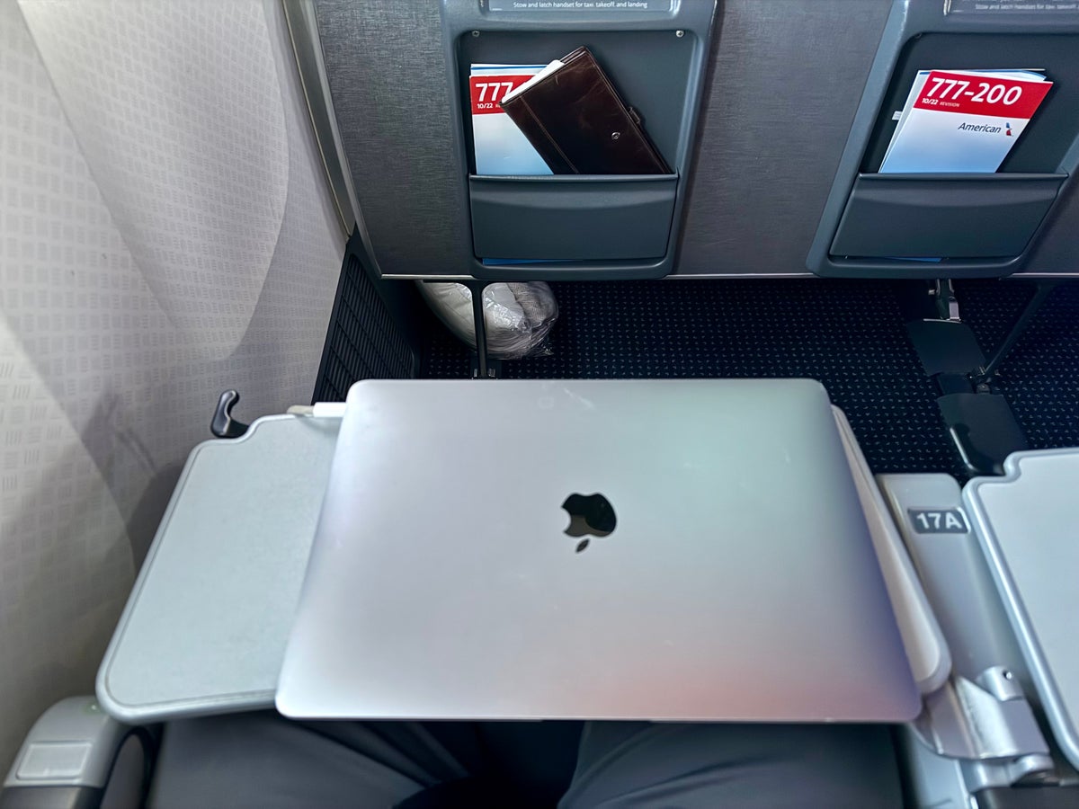 American Airlines economy laptop on tray table