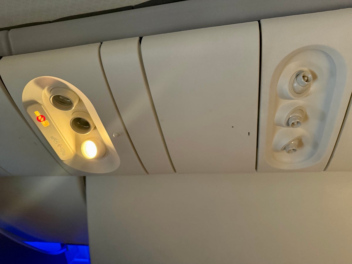 American Airlines economy lights and air vents