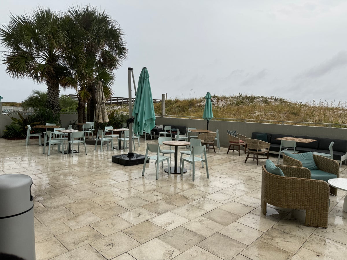 Outdoor Seating at Beal House Fort Walton Beachfront, Tapestry Collection by Hilton.