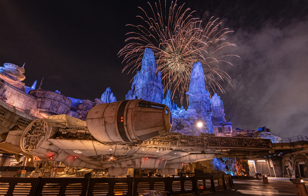 fireworks over Star Wars themed area at Disney