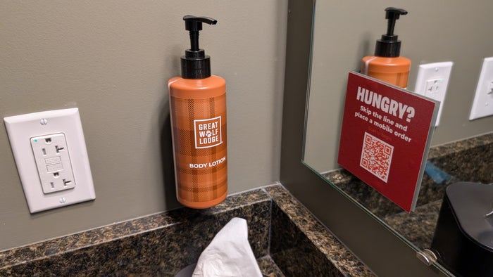 Great Wolf Lodge Webster guestroom lotion and menu QR