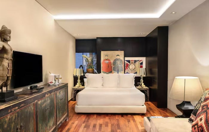 Claris Guest room at hotel with artwork
