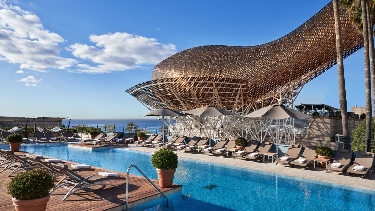 swimming pool overlooking Frank Gehry statue