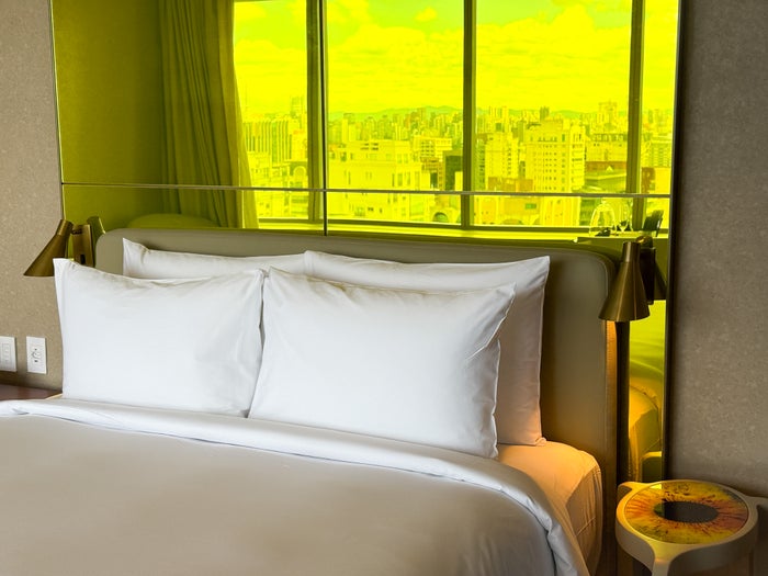 W Sao Paulo Brazil Marriott deluxe room queen beds W Sao Paulo Brazil Marriott bed reflection