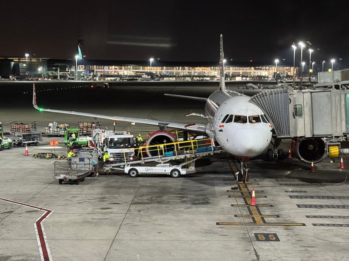 Air India A320 Economy DOH BOM plane from terminal