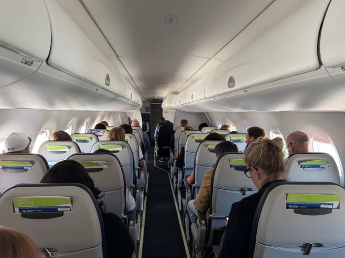 Alaska Airlines economy cabin aisle view on E175LR