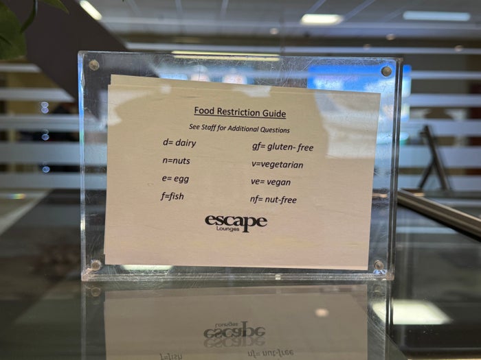 Escape Lounge Centurion Studio Reno RNO allergen sign
