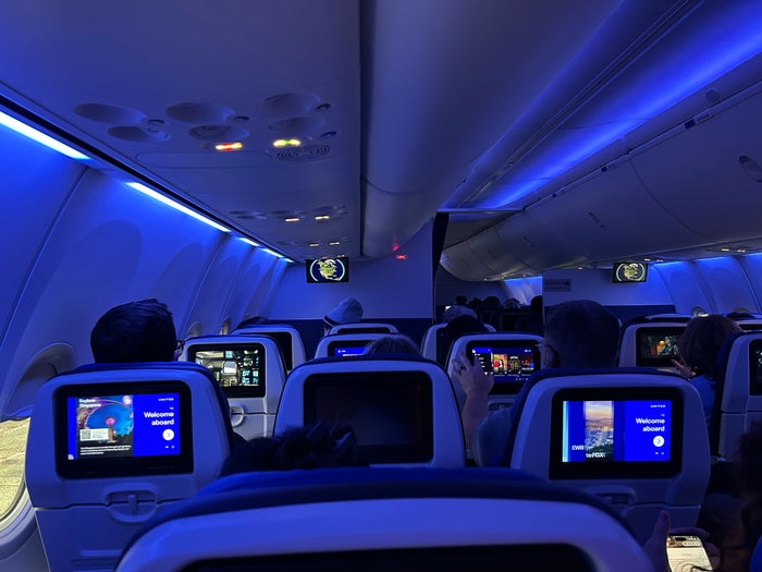 United EWR PDX 737 MAX 9 premium economy cabin dimmed United EWR PDX 737 MAX 9 premium economy cabin dimmed