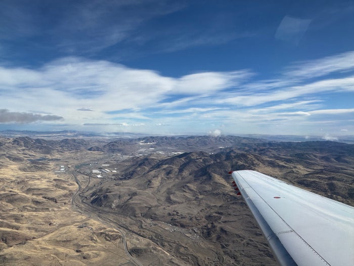 Wing and window view from JSX Embraer ERJ135 plane Wing and window view from JSX Embraer ERJ135 plane