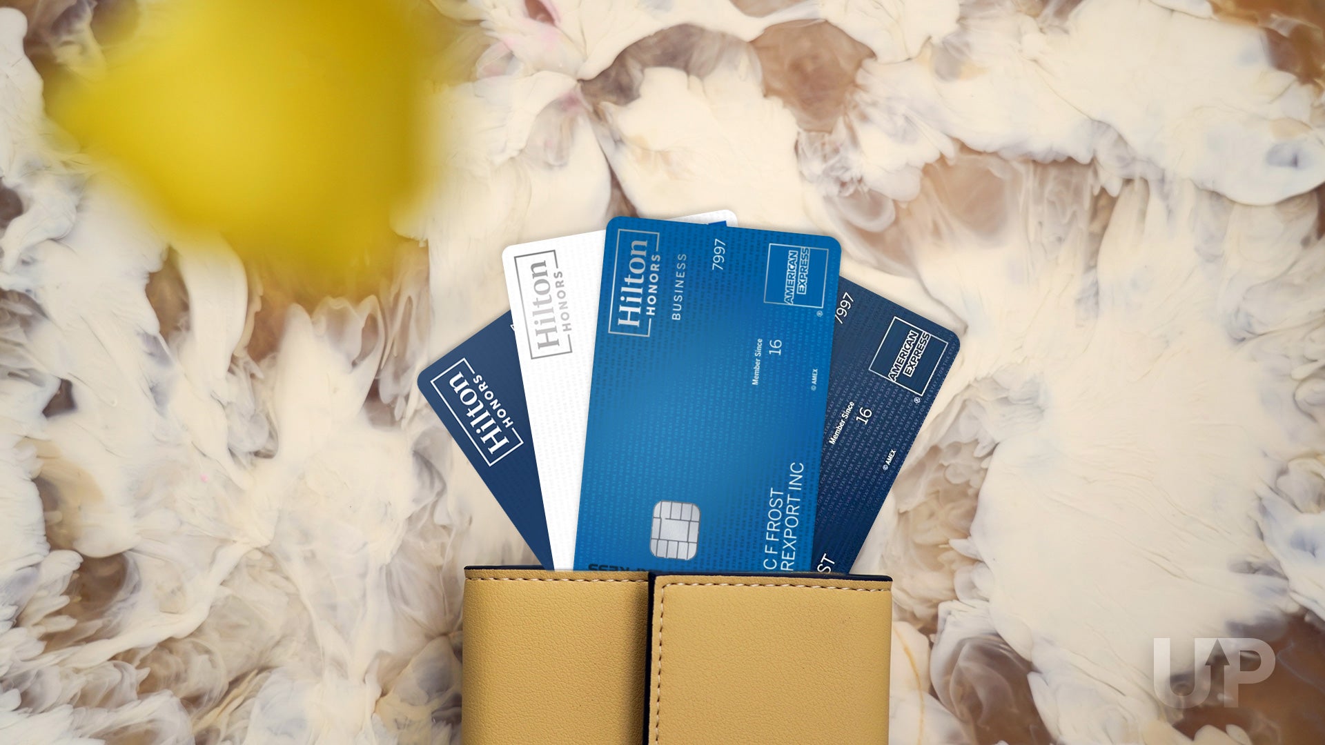 4 Hilton Credit Cards in a Beige Wallet Upgraded Points LLC