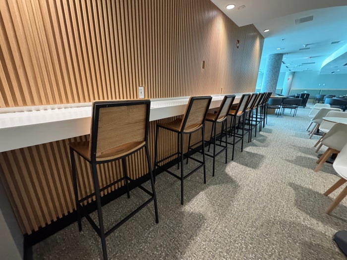 Avianca VIP Lounge high top seating 1