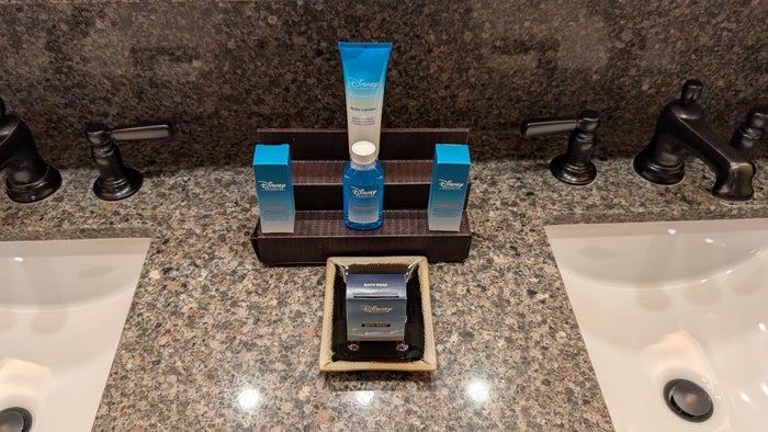 Disneys Animal Kingdom Lodge guest room bathroom counter toiletries Disneys Animal Kingdom Lodge guest room bathroom counter toiletries
