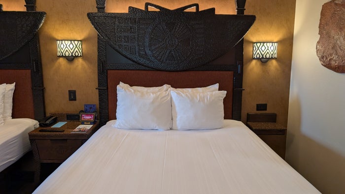 Disneys Animal Kingdom Lodge guest room queen bed Disneys Animal Kingdom Lodge guest room queen bed