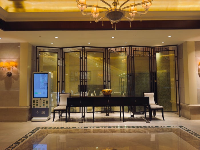 The St. Regis Beijing lobby seating across check in desk The St. Regis Beijing lobby seating across check in desk