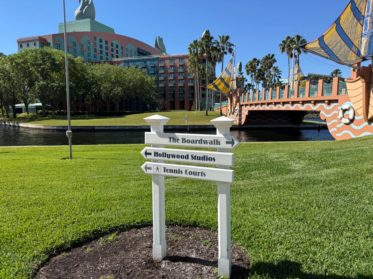 Walking Sign Near Swan and Dolpin