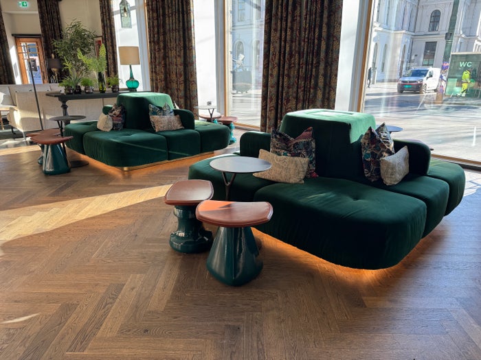 Amerikalinjen lobby green seating Amerikalinjen lobby green seating