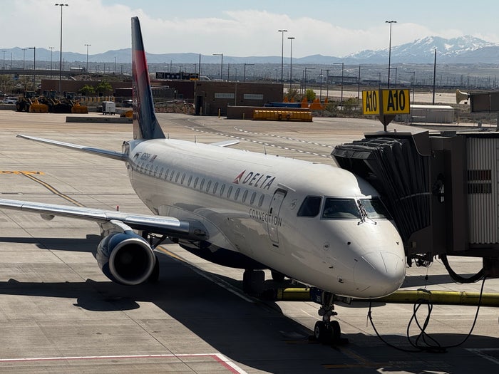 Delta Connection Embraer 175 plane at gate SLC Delta Connection Embraer 175 plane at gate SLC