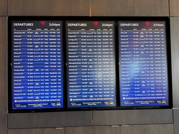 Delta Sky Club SLC Concourse A departure board