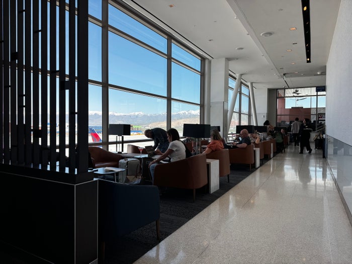 Delta Sky Club SLC Concourse A seating near windows Delta Sky Club SLC Concourse A seating near windows