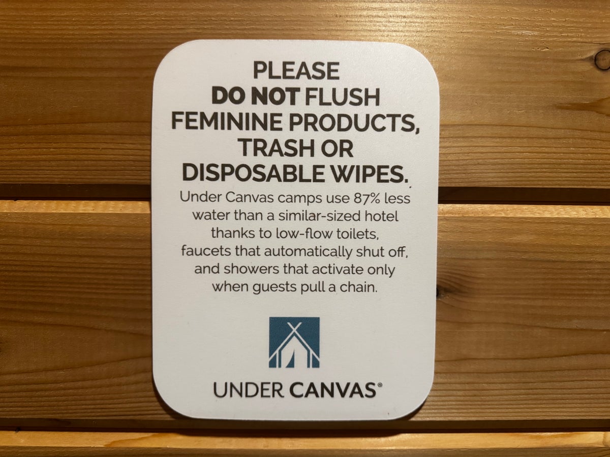 Under Canvas Moab bathroom sign