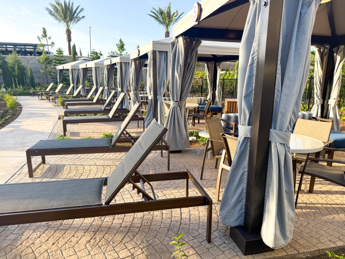 Universal Helios Grand Hotel Loews Hotel Epic Universe pool chairs