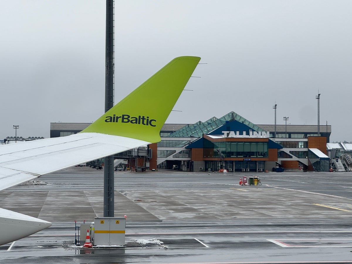 airBaltic A220 300 TLL OSL leaving airport