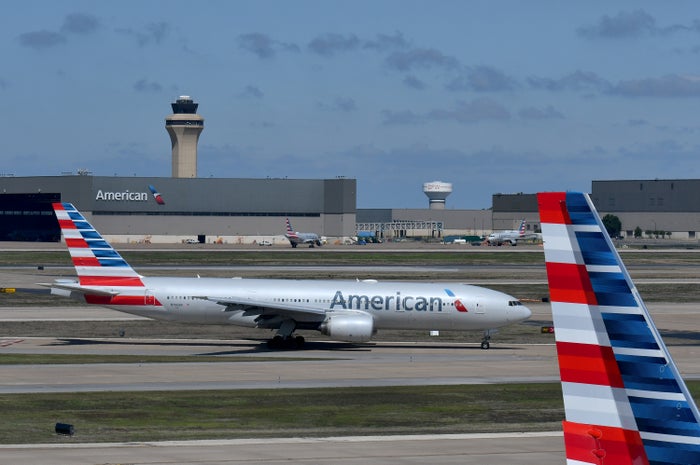 American Airlines scanning boarding pass American Airlines 777 200ER DFW