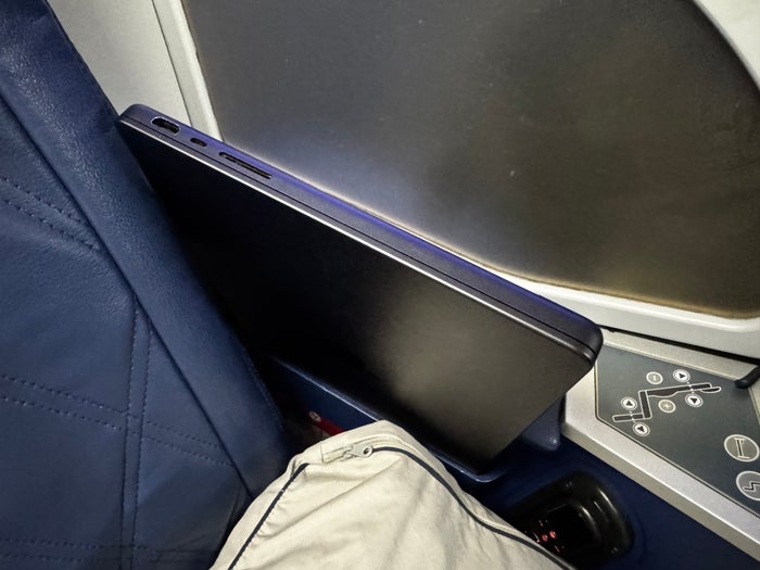 Delta One B757 200 LAX BOS laptop sticking out Delta One B757 200 LAX BOS laptop sticking out