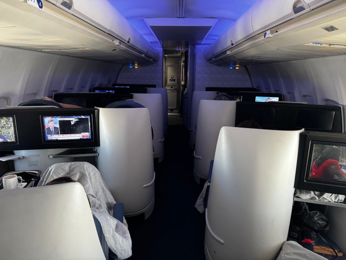 Delta One B757 200 LAX BOS view up aisle light Delta One B757 200 LAX BOS view up aisle light