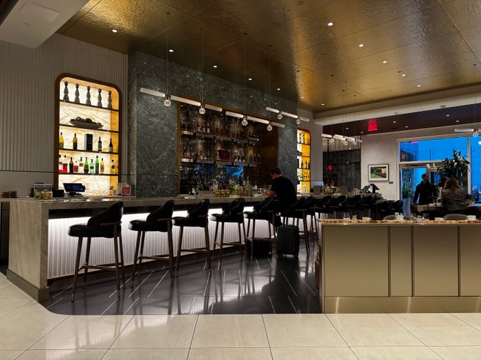 Delta One Lounge LAX bar dimmed lighting Delta One Lounge LAX bar dimmed lighting