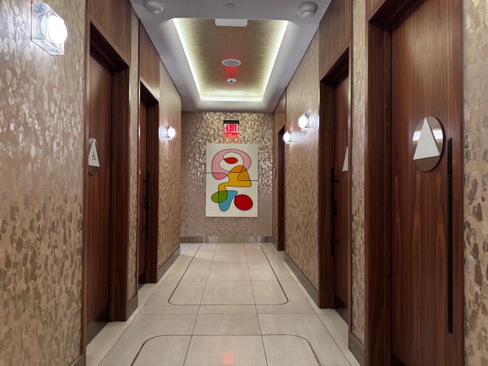 Delta One Lounge LAX bathroom hallway Delta One Lounge LAX bathroom hallway