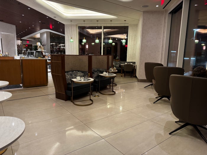 Delta One Lounge LAX seating near sushi and windows Delta One Lounge LAX seating near sushi and windows