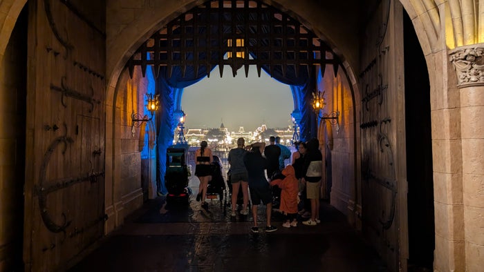 Disney World Magic Kingdom Extra Magic Hours castle rain cover Disney World Magic Kingdom Extra Magic Hours castle rain cover