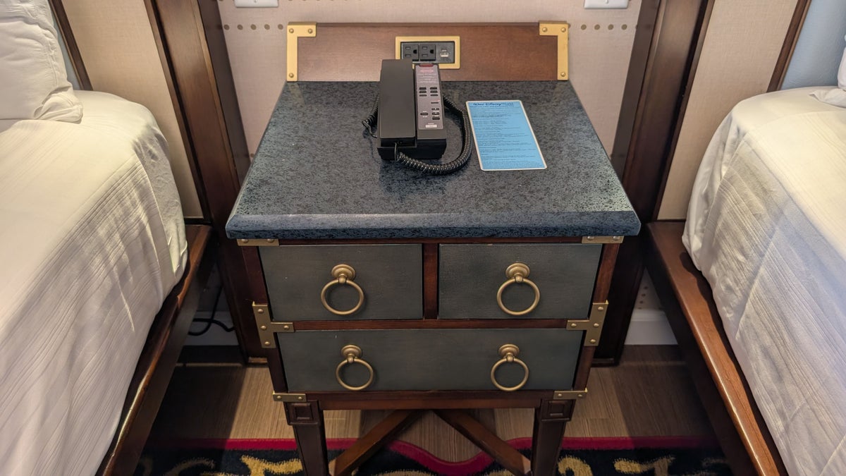 Disneys Yacht Club Resort guest room bed nightstand