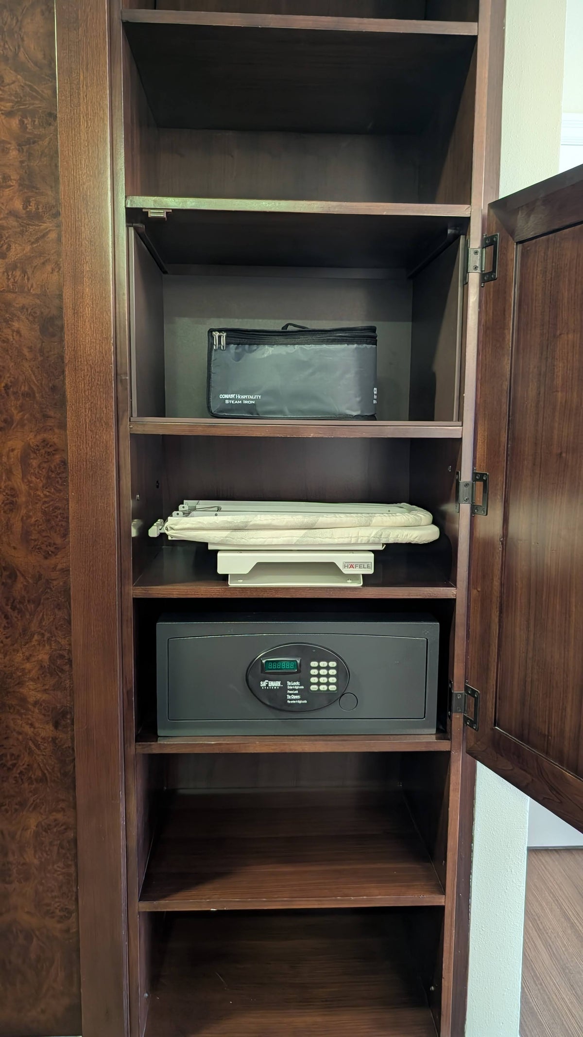 Disneys Yacht Club Resort guest room closet safe and shelves