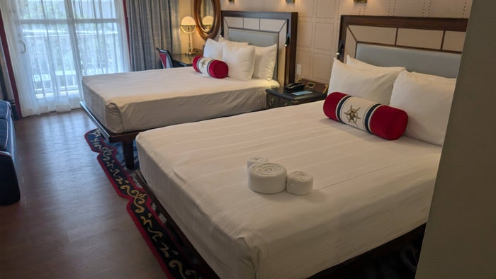 Disneys Yacht Club Resort guest room queen beds Disneys Yacht Club Resort guest room queen beds