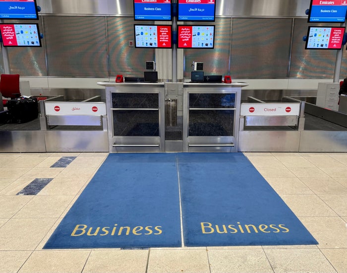 Emirates business class check in at DXB