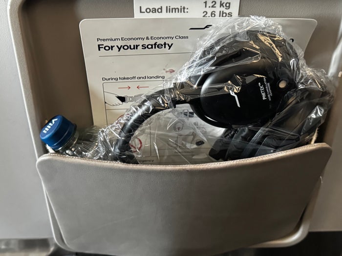 Finnair A350XWB premium economy items in seat pocket Finnair A350XWB premium economy items in seat pocket