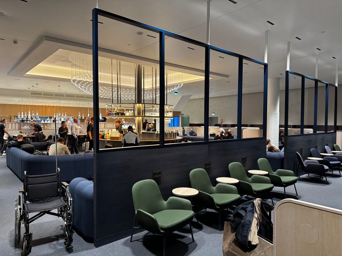 Finnair Lounge Helsinki HEL Non Schengen bar seating blurred