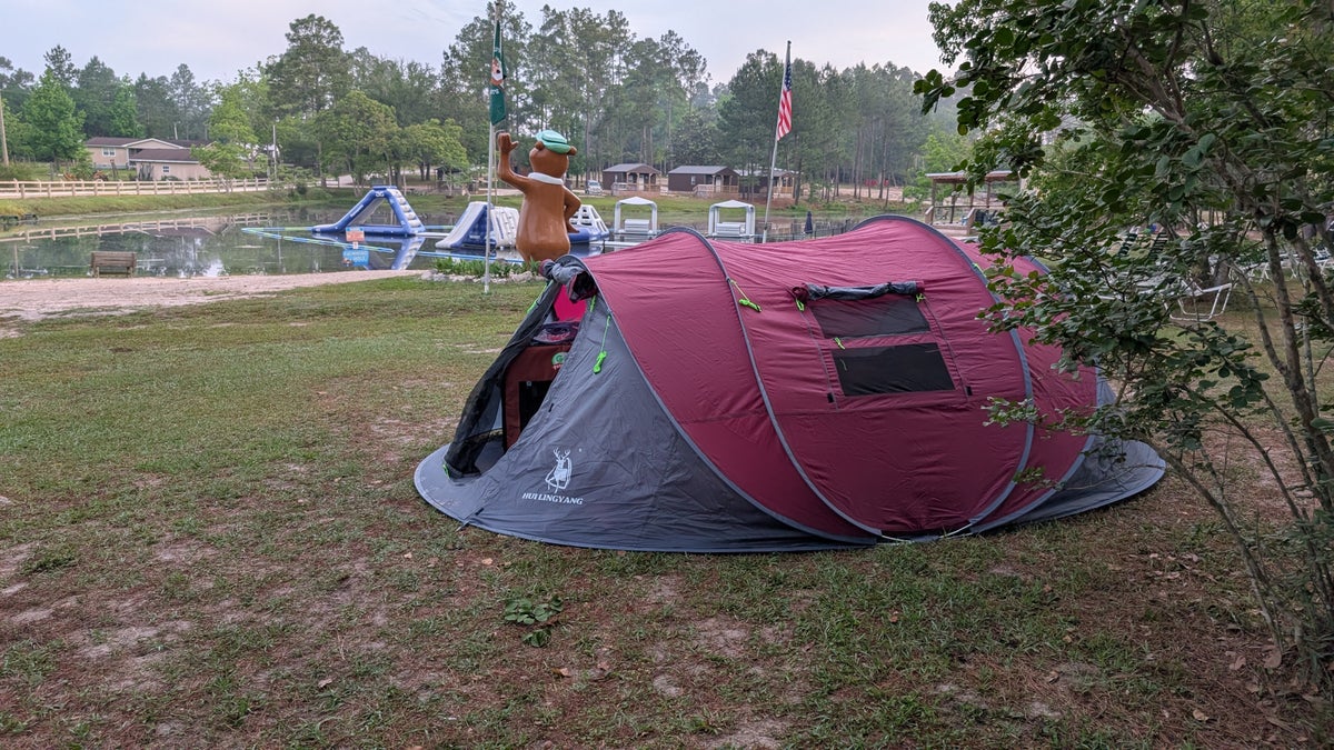 Instant 6 person pop up tent camping at a Jellystone Park pond in Elberta Alabama