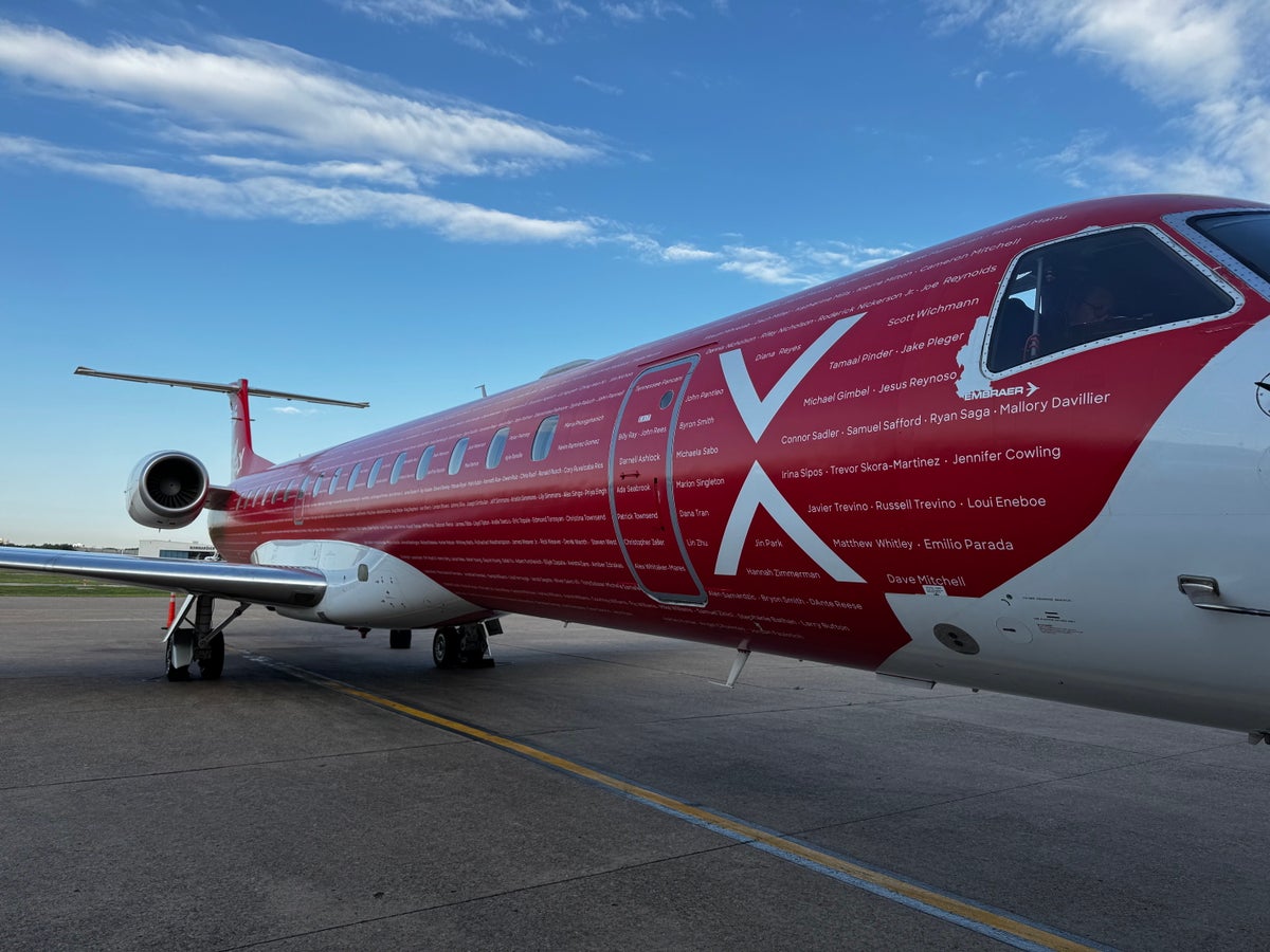 JSX E145 Travel Leisure livery employee names