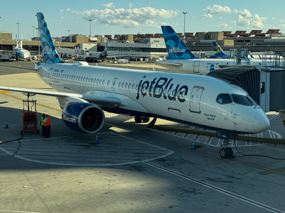 JetBlue Airbus A220 plane at gate BOS airport