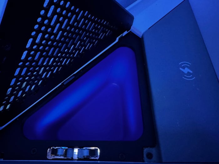 JetBlue Mint A321XLR BOS MAD storage bin wireless charging