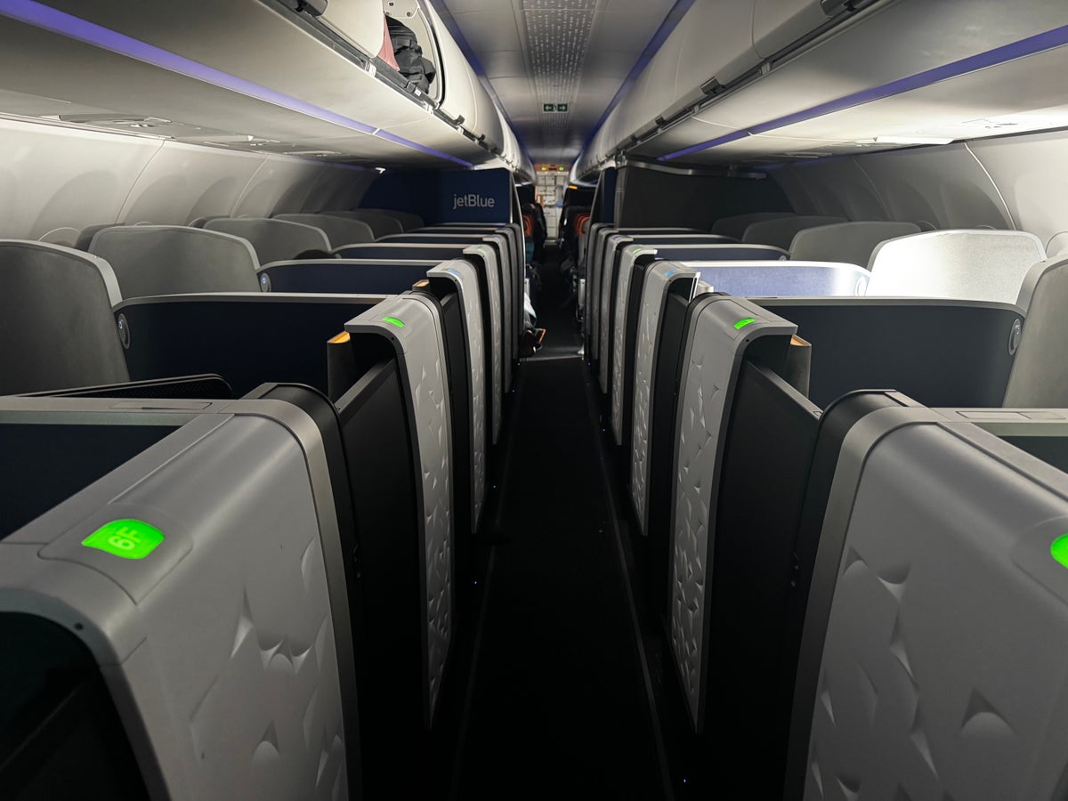 JetBlue Mint A321XLR BOS MAD view to rear lit