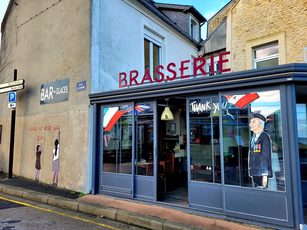 Normandy Cafe With Appreciation Signs